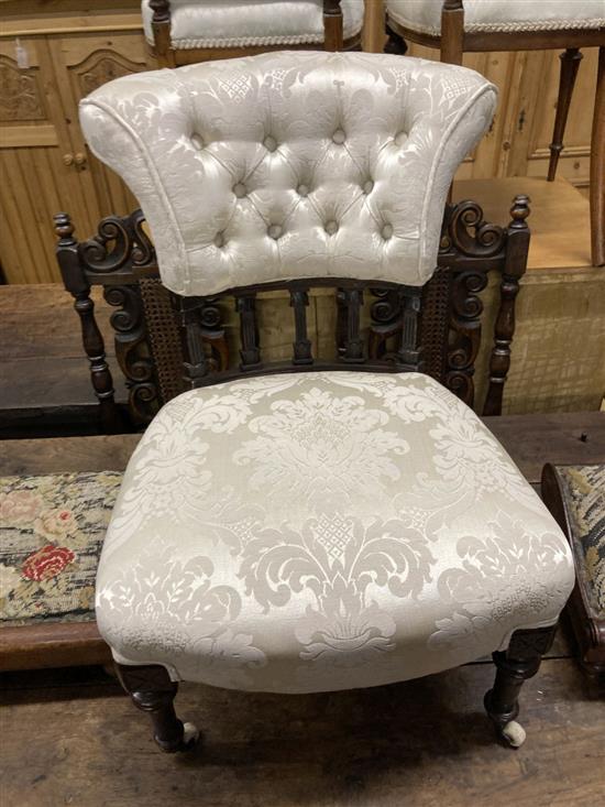 A pair of Victorian mahogany framed tapestry topped gout stools and a later Victorian button backed nursing chair